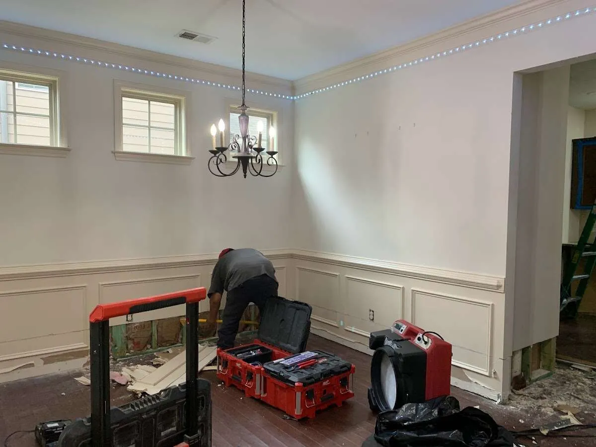 Restoration technician with professional equipment in Braddock